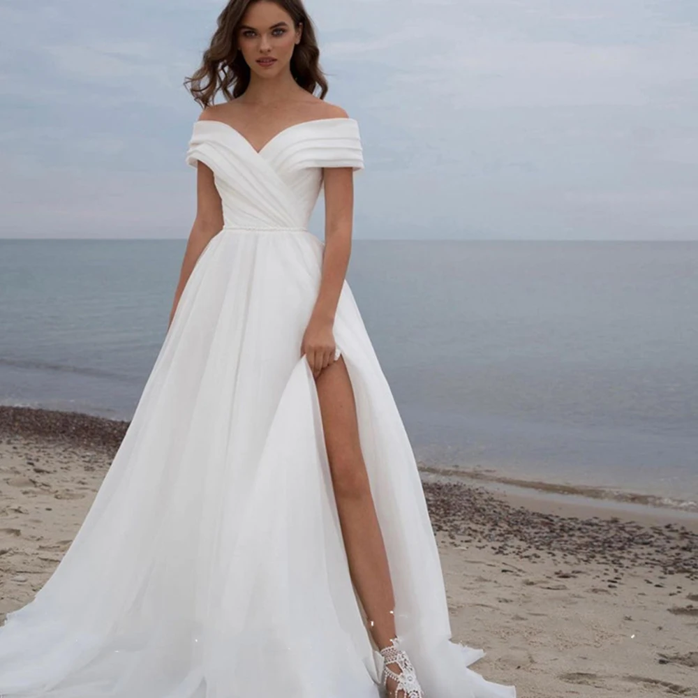 Simple Bride Gowns A Line Backless Organza Wedding Dresses For Women 2022 Off The Shoulder Beach Bridal Gowns Vestido De Novia 
Simple Bride Gowns A Line Backless Organza Wedding Dresses For Women 2022 Off The Shoulder Beach Bridal Gowns Vestido De Novia
