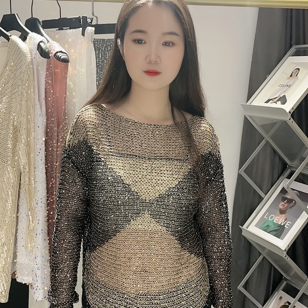 Spring new fashion high street style bat sleeve sequins stitching color long sleeve sweater hollow loose knit top
Spring new fashion high street style bat sleeve sequins stitching color long sleeve sweater hollow loose knit top