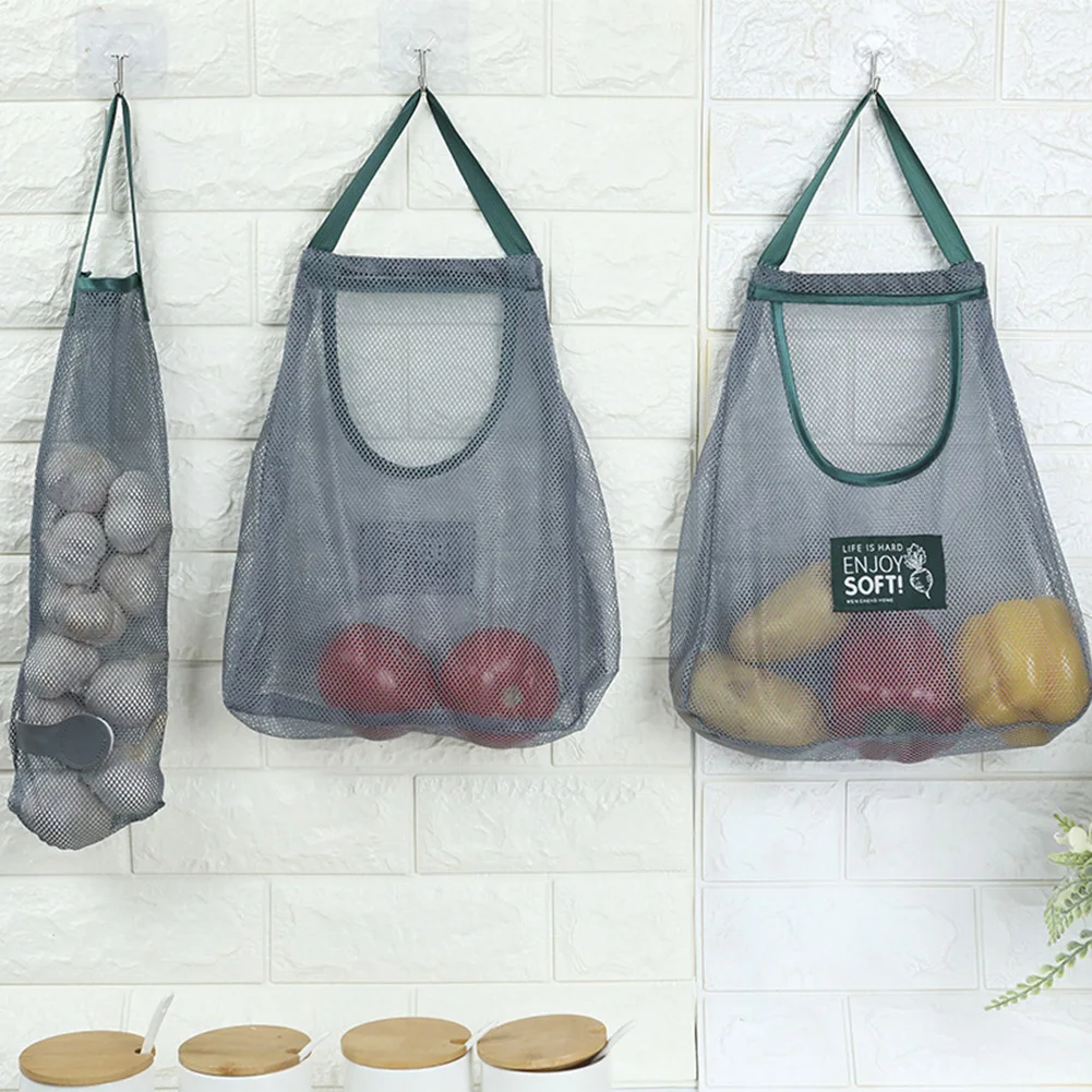 New 1Pcs Mesh Net Reusable Hanging Storage Bags Fruit Vegetable Garlic Onion Organizer Home Hollow Mesh Bag Kitchen Accessories 
New 1Pcs Mesh Net Reusable Hanging Storage Bags Fruit Vegetable Garlic Onion Organizer Home Hollow Mesh Bag Kitchen Accessories