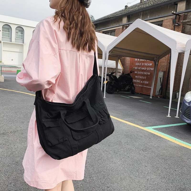 Canvas bag Women's work clothes Wind Tote bag Fashion casual bag Women's large capacity portable messenger bag
Canvas bag Women's work clothes Wind Tote bag Fashion casual bag Women's large capacity portable messenger bag