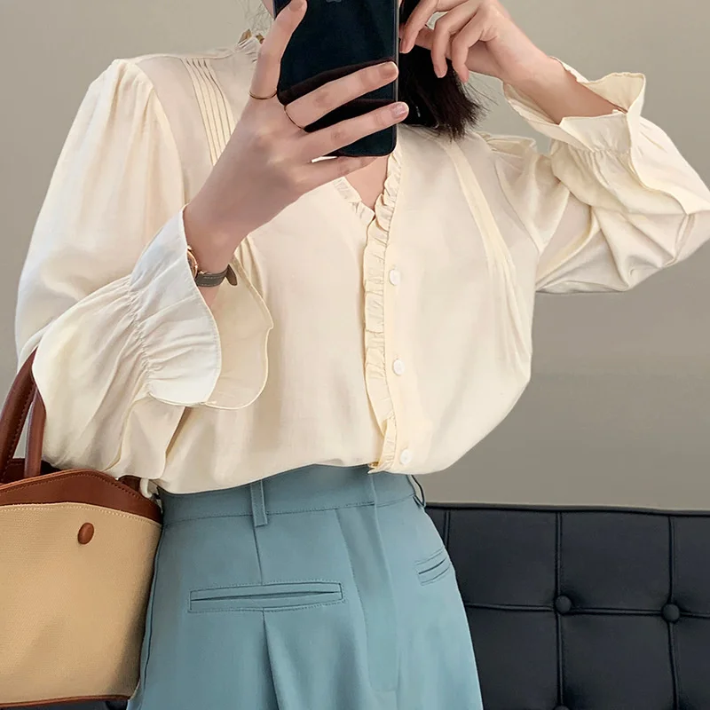 Ruffle Puff Sleeve V Neck Button Up Blouse Beige Spring Women Oversize Long Sleeve Shirts
Ruffle Puff Sleeve V Neck Button Up Blouse Beige Spring Women Oversize Long Sleeve Shirts