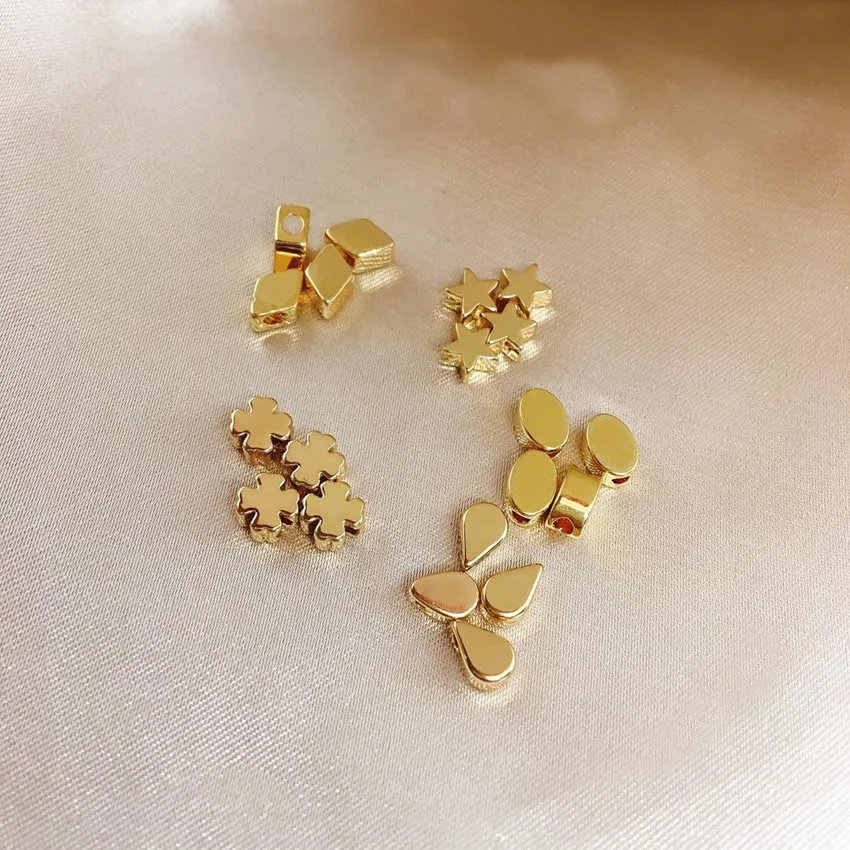 Boutique 18K Copper Gold Plated Stars, Water Drops, Four Leaf Clovers, Diamond Spacer Beads For Handmade Bracelet Necklace DIY
Boutique 18K Copper Gold Plated Stars, Water Drops, Four Leaf Clovers, Diamond Spacer Beads For Handmade Bracelet Necklace DIY