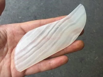 gua sha Silk-wrapped white jade scraping board natural jade massage face-lifting jade board handle traditional chinese medicine
gua sha Silk-wrapped white jade scraping board natural jade massage face-lifting jade board handle traditional chinese medicine