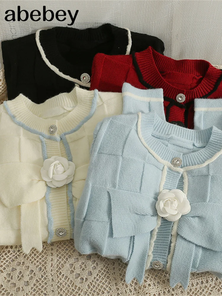 Женский трикотажный кардиган с круглым вырезом, длинным рукавом и бусинами
Женский трикотажный кардиган с круглым вырезом, длинным рукавом и бусинами