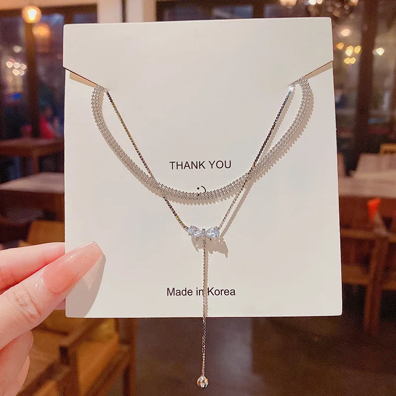 Advanced Design Double Layer Titanium Steel Necklace For Women Ins Wind Exquisite Zircon Bow Clavicle Chain Wholesale
Advanced Design Double Layer Titanium Steel Necklace For Women Ins Wind Exquisite Zircon Bow Clavicle Chain Wholesale