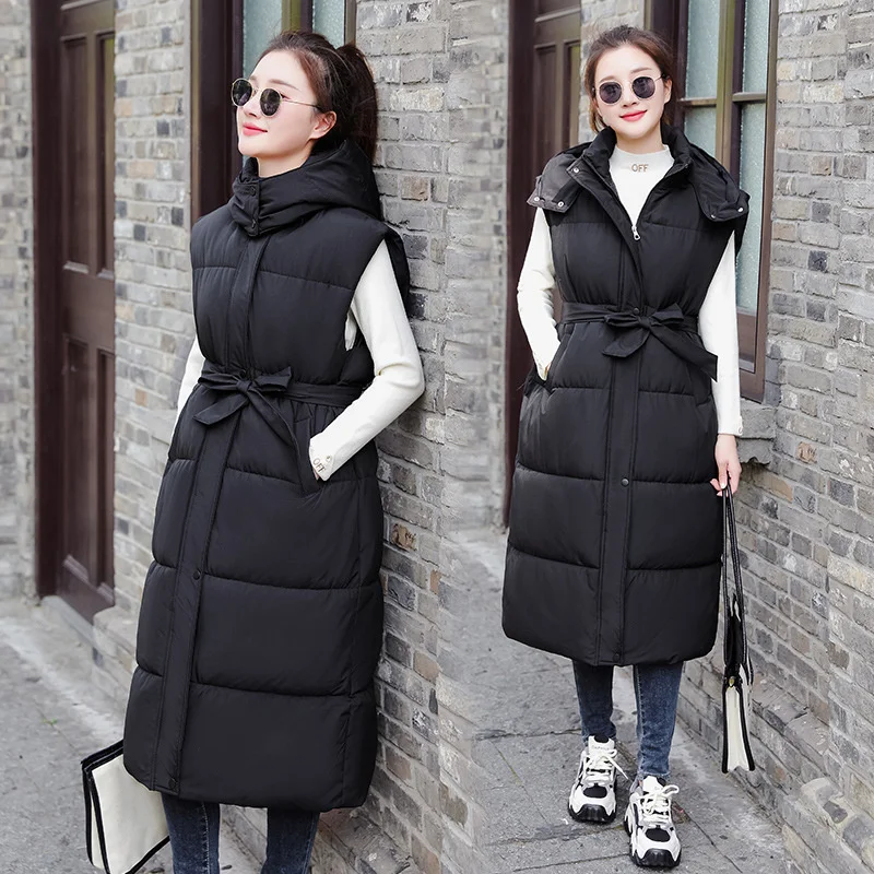 2023 New Winter Ladies Sleeveless Waistcoats Women Solid Color Hooded Long Parkas Vest Warm Black Zipper Hooded Down Coat Parka
2023 New Winter Ladies Sleeveless Waistcoats Women Solid Color Hooded Long Parkas Vest Warm Black Zipper Hooded Down Coat Parka