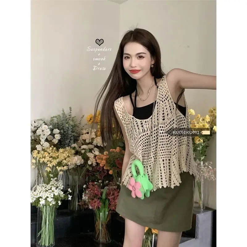 Retro suit female sleeveless hollow knitted undershirt blouse small suspenders summer thin half body skirt three sets
Retro suit female sleeveless hollow knitted undershirt blouse small suspenders summer thin half body skirt three sets