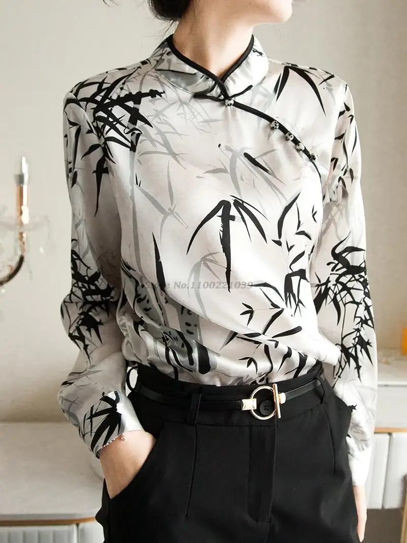 2022 new chinese style traditional top improved cheongsam top bamboo printing oriental qipao collar top women loose silk blouse
2022 new chinese style traditional top improved cheongsam top bamboo printing oriental qipao collar top women loose silk blouse