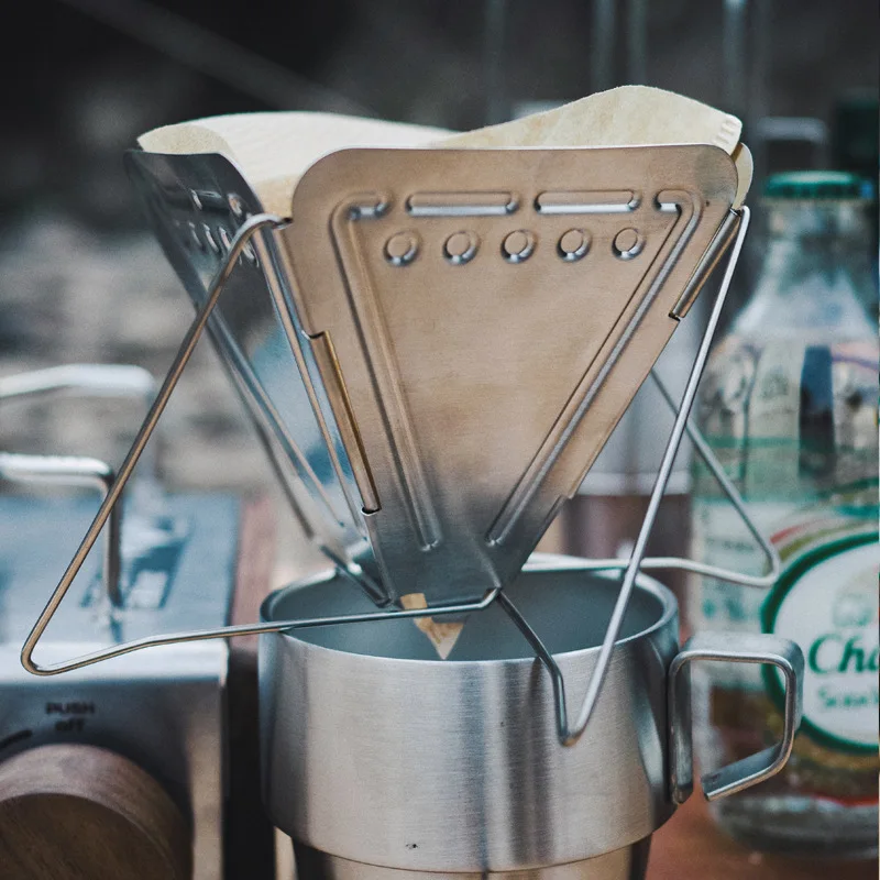 Outdoor camping coffee filter cup stainless steel folding coffee drip coffee filter with bracket.
Outdoor camping coffee filter cup stainless steel folding coffee drip coffee filter with bracket.