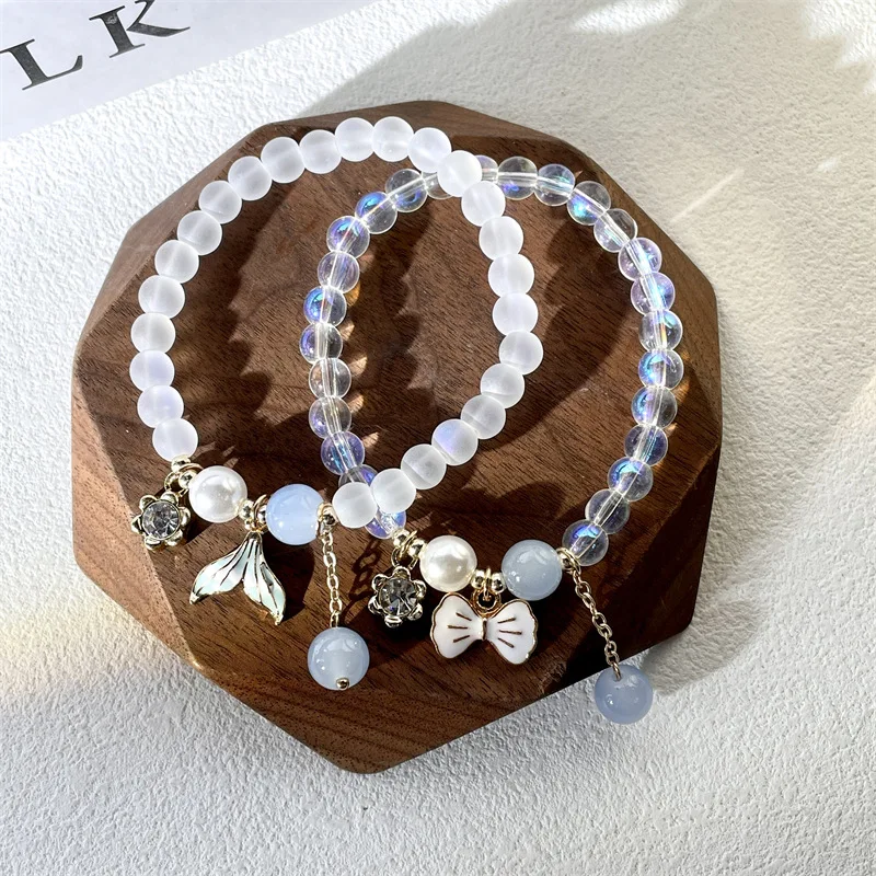 Blue Ocean Wind Girly Frosted Crystal Fishtail Tassel Bracelet Moonstone Bow Flash Drill Elastic Bracelet Jewelry Women's Gift
Blue Ocean Wind Girly Frosted Crystal Fishtail Tassel Bracelet Moonstone Bow Flash Drill Elastic Bracelet Jewelry Women's Gift