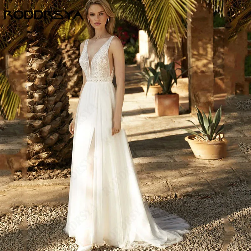RODDRSYA Spaghetti Straps A-Line Bridal Gowns Deep V-Neck Sleeveless Wedding Dresses Backless Lace Appliques Tulle Vestido Novia 
RODDRSYA Spaghetti Straps A-Line Bridal Gowns Deep V-Neck Sleeveless Wedding Dresses Backless Lace Appliques Tulle Vestido Novia
