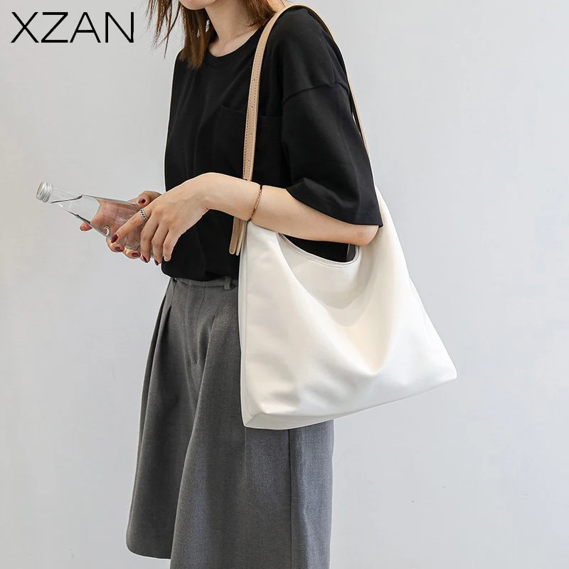 Nylon Tote Bag 2022 Women Designer Handbag Girl Shopper Fashion Casual Minimalist Style Solid Color Large Capacity Shoulder Bags 
Nylon Tote Bag 2022 Women Designer Handbag Girl Shopper Fashion Casual Minimalist Style Solid Color Large Capacity Shoulder Bags