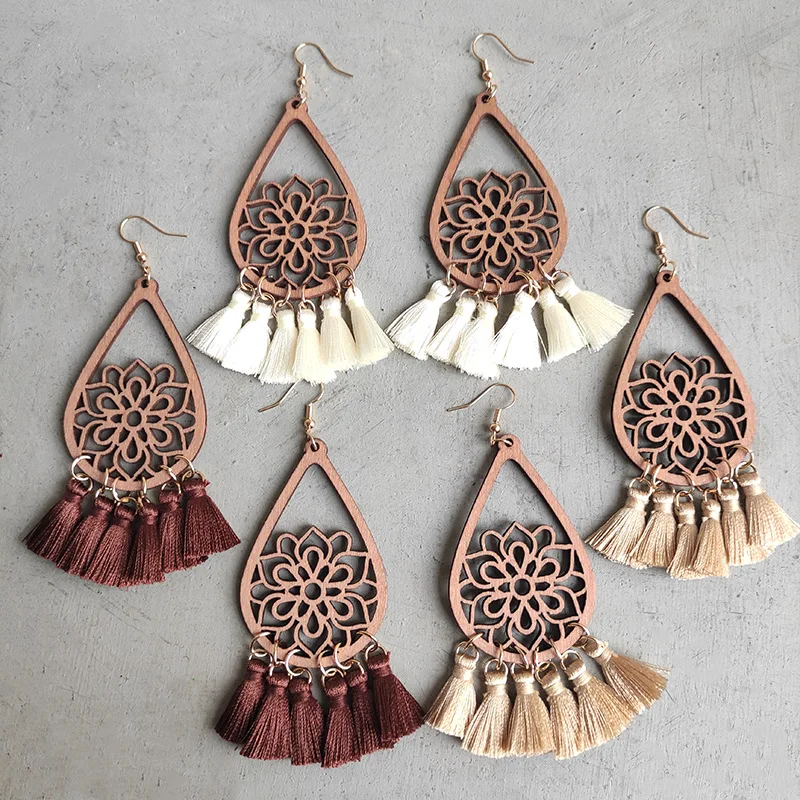 Wholesale Summer Braided Tassel Earrings Morandi Water Drops Hollow Floral Wood Boho Drop Earrings Handmade Jewelry for Women 
Wholesale Summer Braided Tassel Earrings Morandi Water Drops Hollow Floral Wood Boho Drop Earrings Handmade Jewelry for Women