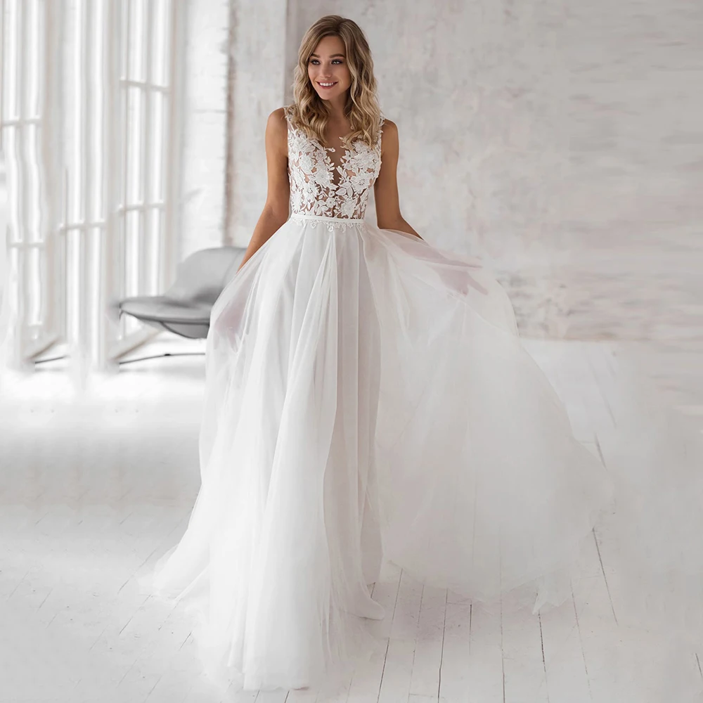 Bohemian Tulle V Neck Wedding Dresses High Quality Sexy Illusion Back Appliques Sleeveless Sweep Train A Line Bridal Gowns
Bohemian Tulle V Neck Wedding Dresses High Quality Sexy Illusion Back Appliques Sleeveless Sweep Train A Line Bridal Gowns