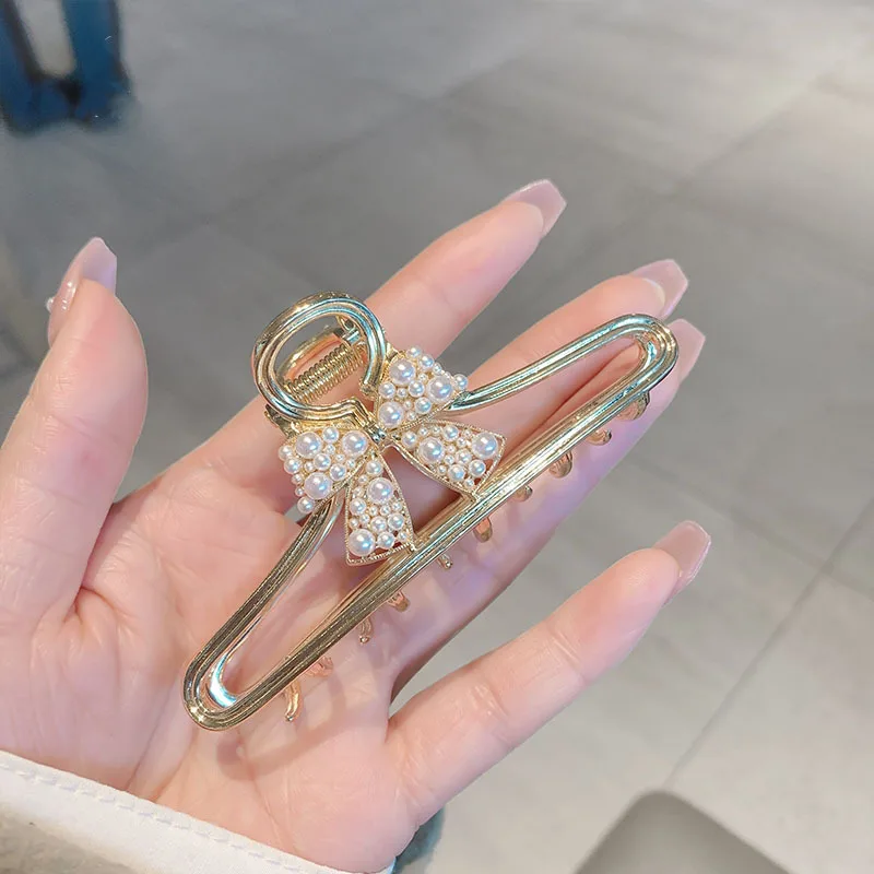 New French High-end Elegant Pearl Bow Grab Clip, Medium Disc Hairpin, High-Grade Shark Clip
New French High-end Elegant Pearl Bow Grab Clip, Medium Disc Hairpin, High-Grade Shark Clip