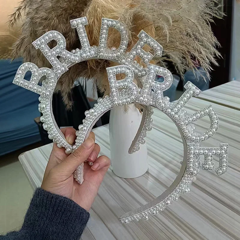 1PC Imitation Pearl Hairband Wifey Crown Bride Pearl Crown Headband Bridal Shower Hair Accessories Wedding supplies
1PC Imitation Pearl Hairband Wifey Crown Bride Pearl Crown Headband Bridal Shower Hair Accessories Wedding supplies