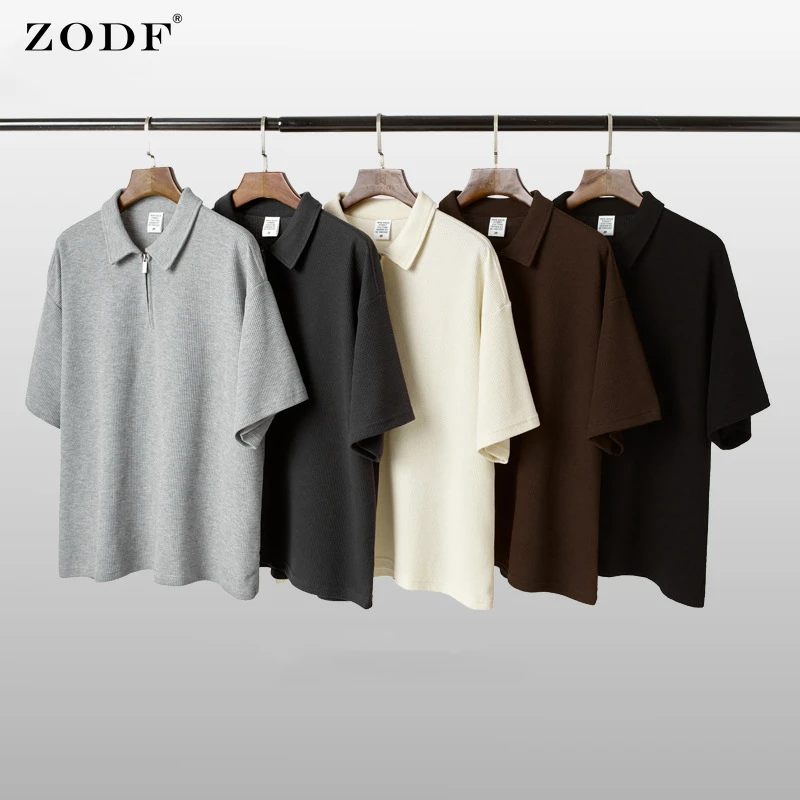 Мужские футболки ZODF 2022 с вафельным отложным воротником, уличная одежда, свободные дышащие футболки унисекс с полумолнией, брендовые Топы ...
Мужские футболки ZODF 2022 с вафельным отложным воротником, уличная одежда, свободные дышащие футболки унисекс с полумолнией, брендовые Топы ...