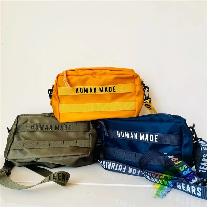 Vintage HUMAN MADE Bag Men Women Best Quality Outdoor Military Style HUMAN MADE Nylon Shoulder Messenger Bag
Vintage HUMAN MADE Bag Men Women Best Quality Outdoor Military Style HUMAN MADE Nylon Shoulder Messenger Bag