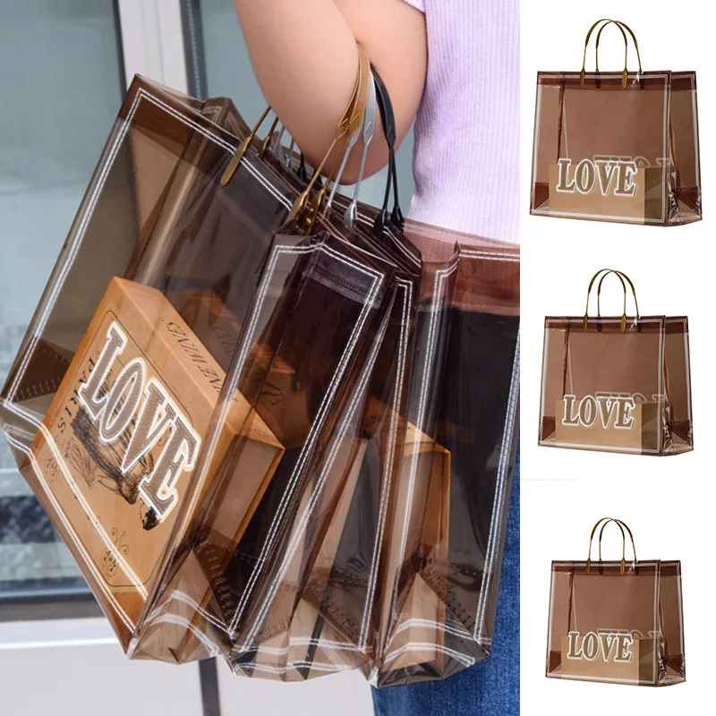 Reusable PVC Thick Tote Bags For Women Casual Portable Handbag Waterproof Gift Bag Clothing Bags Reused Plastic Shopping Bag
Reusable PVC Thick Tote Bags For Women Casual Portable Handbag Waterproof Gift Bag Clothing Bags Reused Plastic Shopping Bag