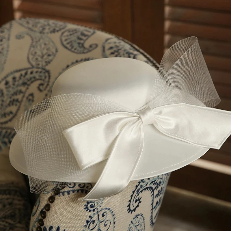 Big Bowknot Satin Top Hat Wide Brim Women Banquet Elegant Vintage Fashion Wedding Bucket Sun Hat with Bow for Spring Summer
Big Bowknot Satin Top Hat Wide Brim Women Banquet Elegant Vintage Fashion Wedding Bucket Sun Hat with Bow for Spring Summer
