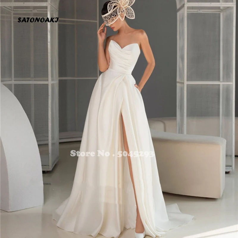 Simple Strapless A Line Wedding Dress 2022 for Women Backless High Slit Satin Bridal Gown With Pocket Court Train Robe De Mariée
Simple Strapless A Line Wedding Dress 2022 for Women Backless High Slit Satin Bridal Gown With Pocket Court Train Robe De Mariée