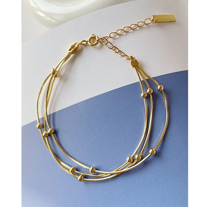 MLKENLY, темпераментный золотистый трехслойный золотистый браслет со змеиным плетением, женский браслет из серебра 100% пробы
MLKENLY, темпераментный золотистый трехслойный золотистый браслет со змеиным плетением, женский браслет из серебра 100% пробы