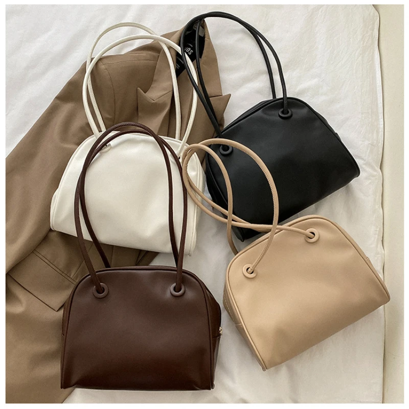 Сумка на плечо Женская в стиле ретро, большая сумочка-тоут в Корейском стиле, нишевой дизайн для подмышек, однотонный саквояж на двух лямках
Сумка на плечо Женская в стиле ретро, большая сумочка-тоут в Корейском стиле, нишевой дизайн для подмышек, однотонный саквояж на двух лямках