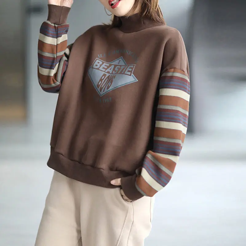 2022 new stand collar autumn and winter hot selling fleece sweater women's fashion printing western style loose coat tide
2022 new stand collar autumn and winter hot selling fleece sweater women's fashion printing western style loose coat tide