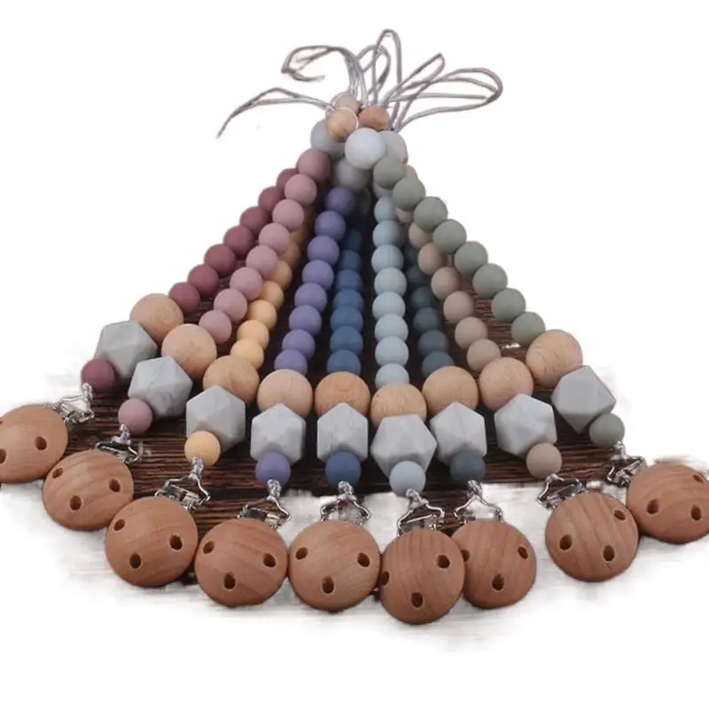 Safety Wooden Baby Infant Toddler Dummy Pacifier Silicone Soother Nipple Clip Chain Holder Strap Baby Chew Baby Teether Teething
Safety Wooden Baby Infant Toddler Dummy Pacifier Silicone Soother Nipple Clip Chain Holder Strap Baby Chew Baby Teether Teething