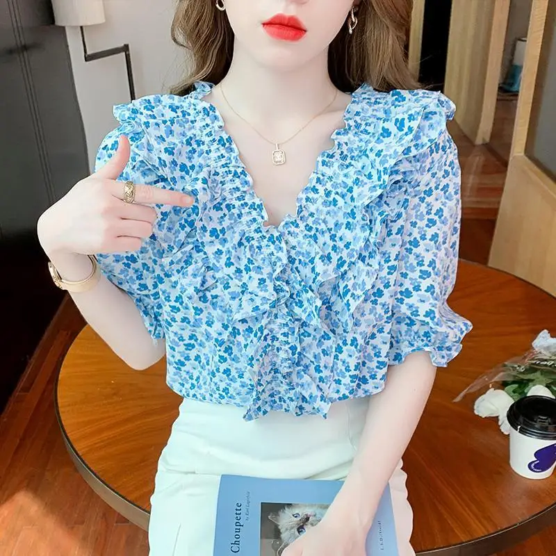 Western blouse female V -neck temperament short -sleeved top summer sweet printed lotus leaf bubble sleeve jersey blouse female
Western blouse female V -neck temperament short -sleeved top summer sweet printed lotus leaf bubble sleeve jersey blouse female