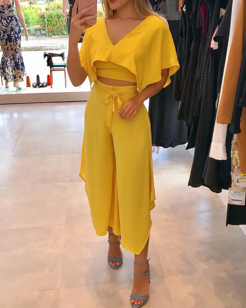 Solid Color V Neck Top High Waist Belt Loose Women 2pcs Clothes Set Half Sleeve Wide Leg Pants
Solid Color V Neck Top High Waist Belt Loose Women 2pcs Clothes Set Half Sleeve Wide Leg Pants