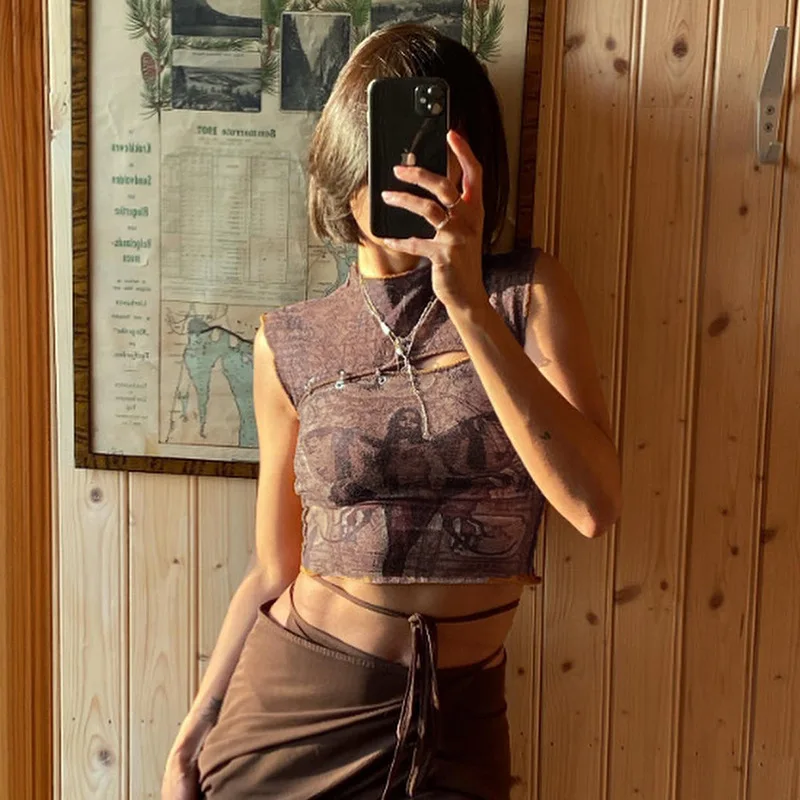 Women's Summer Slim Crop Tops Brown Sleeveless O Neck Portrait Print Hollow Tank Tops
Women's Summer Slim Crop Tops Brown Sleeveless O Neck Portrait Print Hollow Tank Tops