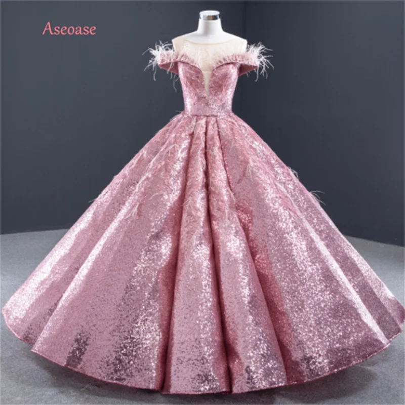 Pink Quinceanera Dresses Ball Gown Off The Shoulder Sequins Feather Mexican Sweet 16 Dresses 15 Anos
Pink Quinceanera Dresses Ball Gown Off The Shoulder Sequins Feather Mexican Sweet 16 Dresses 15 Anos