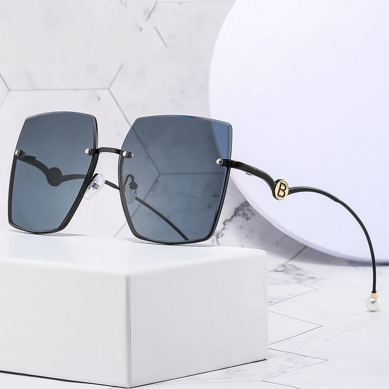 Brand Design Semi-Rimless Pearl Sunglasses For Women Fashion Trend Elegant Ladies Female Car Driving Summer Beach Metal Glasses
Brand Design Semi-Rimless Pearl Sunglasses For Women Fashion Trend Elegant Ladies Female Car Driving Summer Beach Metal Glasses