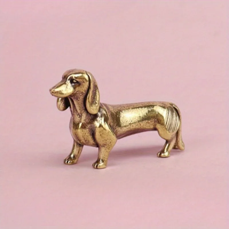 Статуэтка таксы из латуни 
Статуэтка таксы из латуни