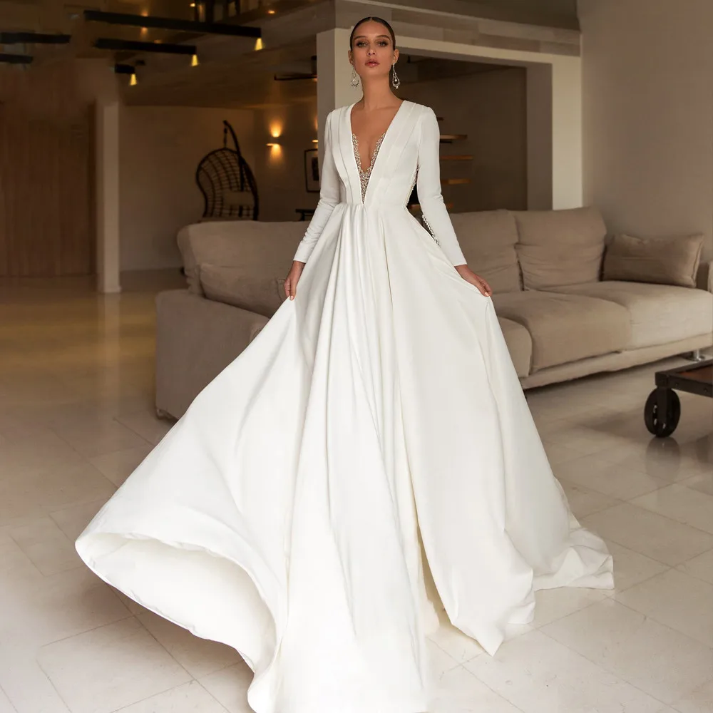 Luxury Beaded Satin V-Neck Wedding Dress Elegant v-neck Long Sleeve A-Line Court Train Bride Gown Vestido de noiva
Luxury Beaded Satin V-Neck Wedding Dress Elegant v-neck Long Sleeve A-Line Court Train Bride Gown Vestido de noiva