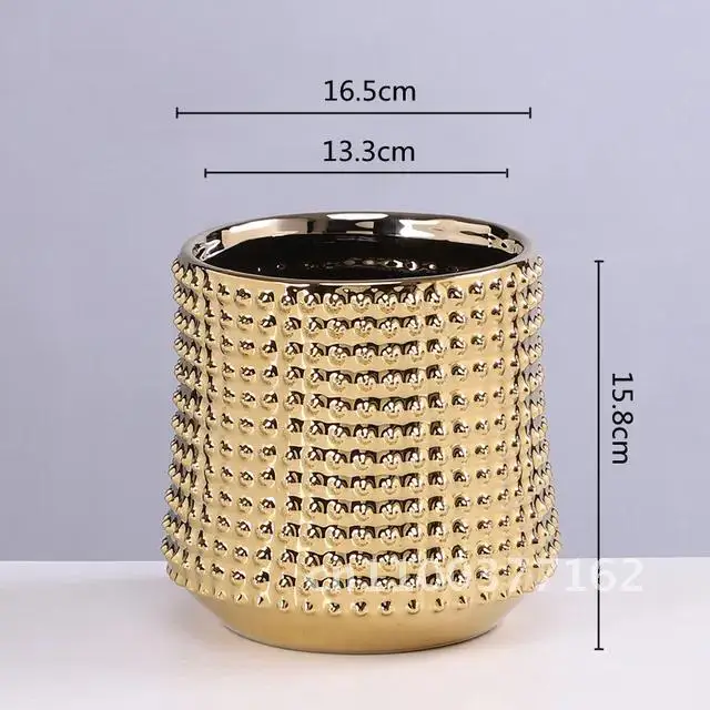 Золотой керамический горшок Plantas
Золотой керамический горшок Plantas