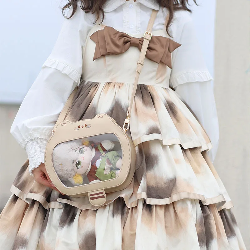Сумка MBTI Lolita с рисунком енота для женщин, милая мультяшная сумка на плечо с вышивкой, прозрачная модная женская сумка из ПВХ кожи
Сумка MBTI Lolita с рисунком енота для женщин, милая мультяшная сумка на плечо с вышивкой, прозрачная модная женская сумка из ПВХ кожи