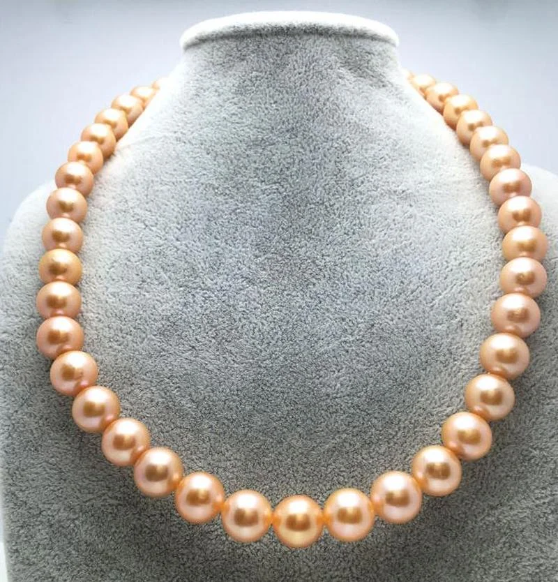 Huge charming 11-12mm natural south sea genuine pink round necklace free shipping women jewelry
Huge charming 11-12mm natural south sea genuine pink round necklace free shipping women jewelry
