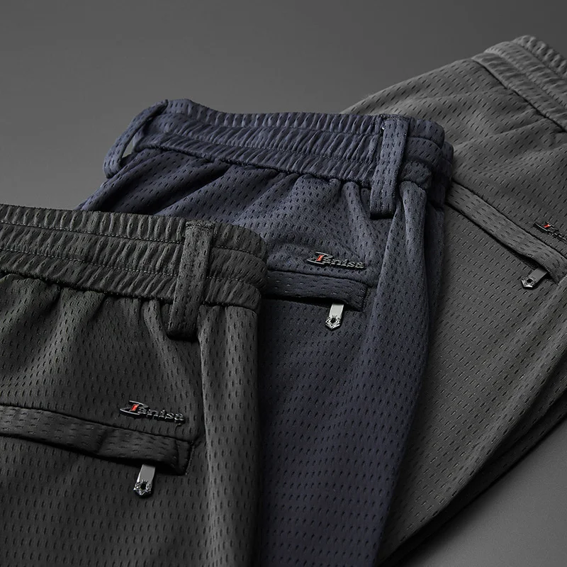 Thin Ice Silk Summer Casual Pants Men Clothing Mash Loose Quick Dry Male Trousers Sportwear With Zipper Pockets Mens Pants Black
Thin Ice Silk Summer Casual Pants Men Clothing Mash Loose Quick Dry Male Trousers Sportwear With Zipper Pockets Mens Pants Black