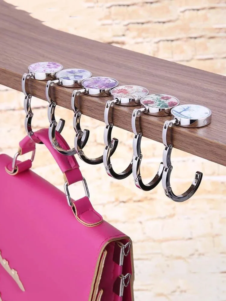 Metal Folded Handbag Hook Portable Fashion Folding Alloy Purse Bag Hanger Hook Holder Travel Supplies Table Organizer Hooks
Metal Folded Handbag Hook Portable Fashion Folding Alloy Purse Bag Hanger Hook Holder Travel Supplies Table Organizer Hooks
