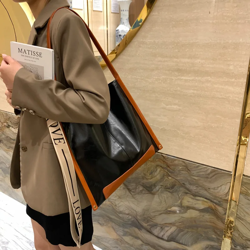 Luxury Leather Fashion Handbags 2021 Autumn and Winter Retro Large-capacity Casual Shoulder Bag Oil Wax PU Simple Tote Bag
Luxury Leather Fashion Handbags 2021 Autumn and Winter Retro Large-capacity Casual Shoulder Bag Oil Wax PU Simple Tote Bag