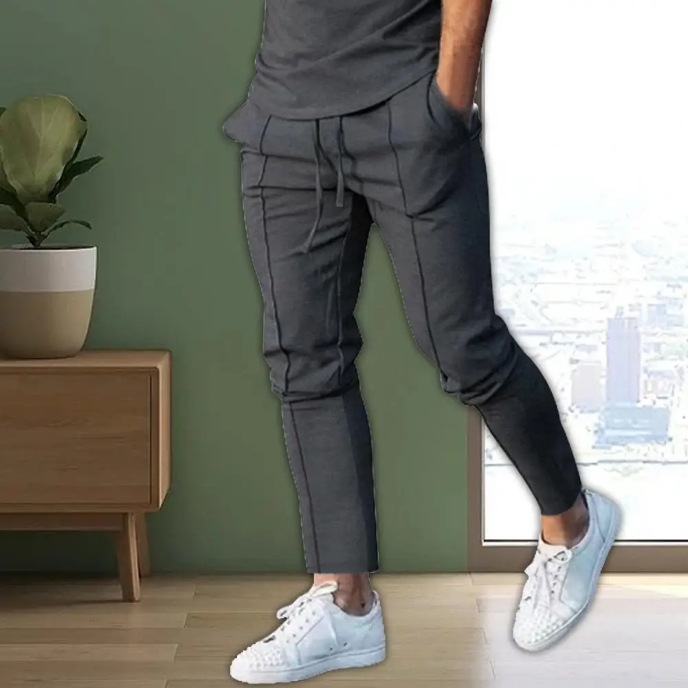 Stylish Men Trousers Bottoms Men Sweatpants Pockets Lace-up Mid Waist Sweatpants Loose
Stylish Men Trousers Bottoms Men Sweatpants Pockets Lace-up Mid Waist Sweatpants Loose