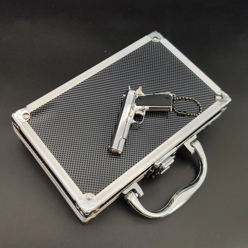 Aluminum Alloy Pistol Miniature Storage Box Mini Gun Model Keychain Pendant Suitcase Small Tool Organizer House Home Accessories
Aluminum Alloy Pistol Miniature Storage Box Mini Gun Model Keychain Pendant Suitcase Small Tool Organizer House Home Accessories