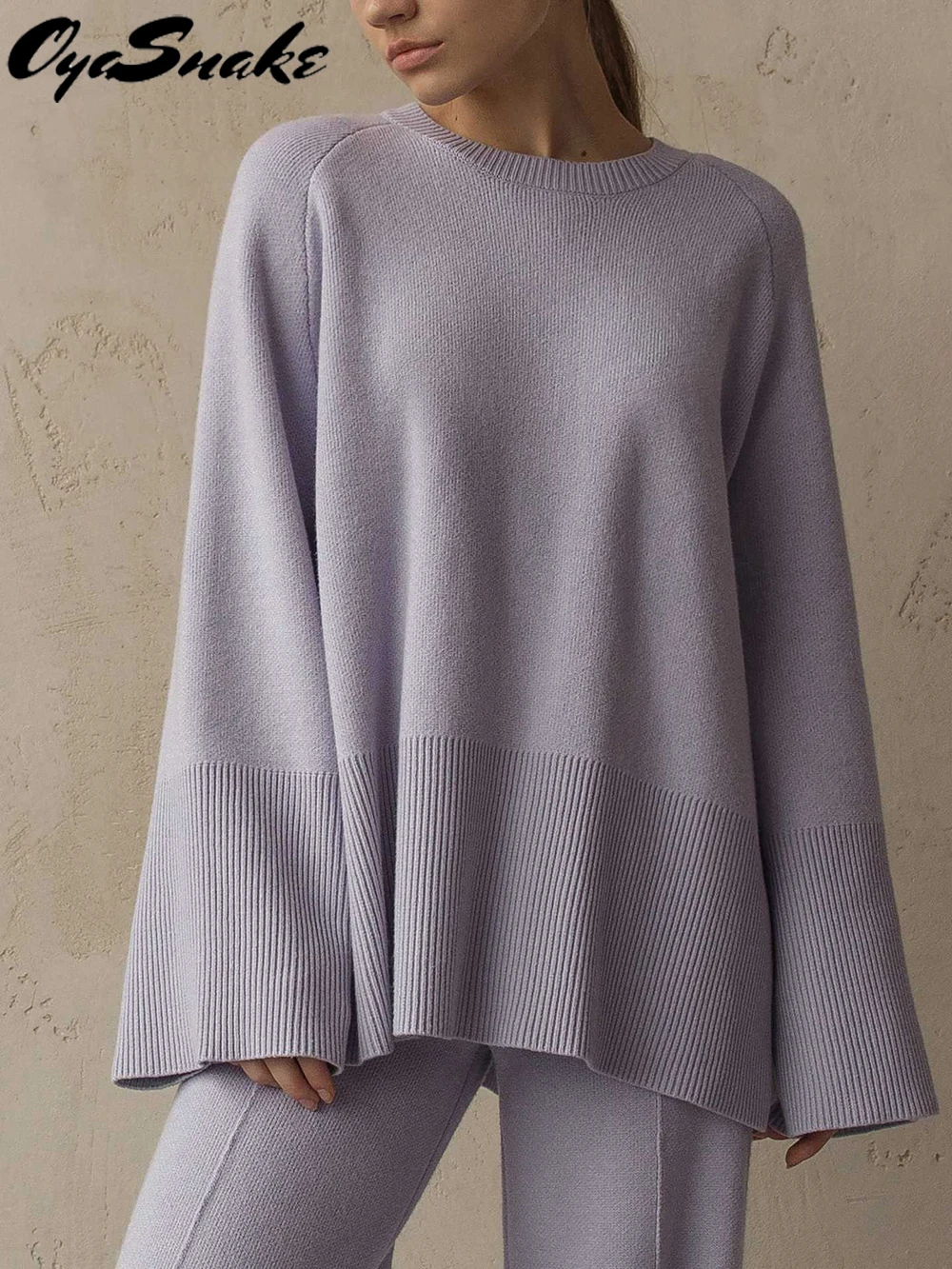 Oyasnake Knitted Women sets O-Neck Flare Sleeve Loose Pullover Sweater+Drawstrin Waist Split wide-Leg Pants Casual 2-piece suits
Oyasnake Knitted Women sets O-Neck Flare Sleeve Loose Pullover Sweater+Drawstrin Waist Split wide-Leg Pants Casual 2-piece suits