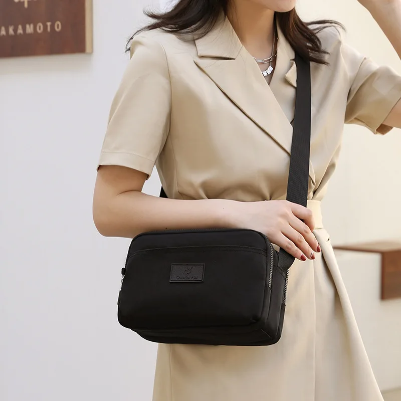 New Nylon Handbags Messenger Bag Waterproof Oxford Cloth Bag Canvas Shoulder Bag To Collect Wallet Diagonal Bag Female
New Nylon Handbags Messenger Bag Waterproof Oxford Cloth Bag Canvas Shoulder Bag To Collect Wallet Diagonal Bag Female