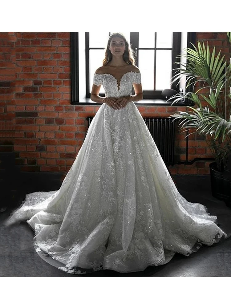 Princess O-Neck Bride Ball Gown Romantic Appliques Back Button Wedding Dresses 2023 Beading Short Sleeves Vestido De Novia
Princess O-Neck Bride Ball Gown Romantic Appliques Back Button Wedding Dresses 2023 Beading Short Sleeves Vestido De Novia