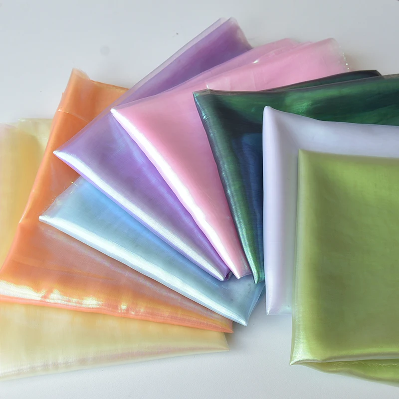 Fashion Fluorescent Fabrics Colorful Shiny Gauze Fabric Stage Wedding Decor Voile Transparent Holographic Fabric by the meter
Fashion Fluorescent Fabrics Colorful Shiny Gauze Fabric Stage Wedding Decor Voile Transparent Holographic Fabric by the meter