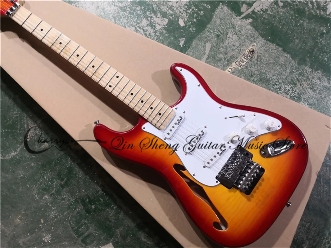 Электрогитара с 6 струнами, струнная гитара, полуполая подошва cherry sunburst, мост tremolo, огненный кленовый шпон
Электрогитара с 6 струнами, струнная гитара, полуполая подошва cherry sunburst, мост tremolo, огненный кленовый шпон