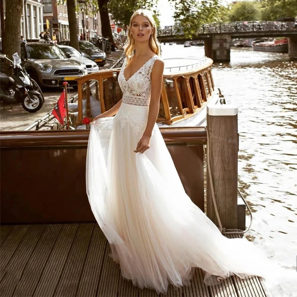 Bohemian Lace Wedding Dresses 2023 V-Neck Floor Length Backless Tulle Women Brides Gowns Robe De Mariee Sleeveless свадебное пла
Bohemian Lace Wedding Dresses 2023 V-Neck Floor Length Backless Tulle Women Brides Gowns Robe De Mariee Sleeveless свадебное пла